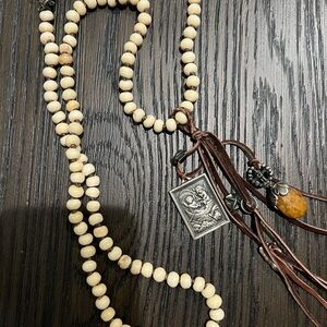 Love Heals long necklace. Leather, beads, ink stone and silver accents.